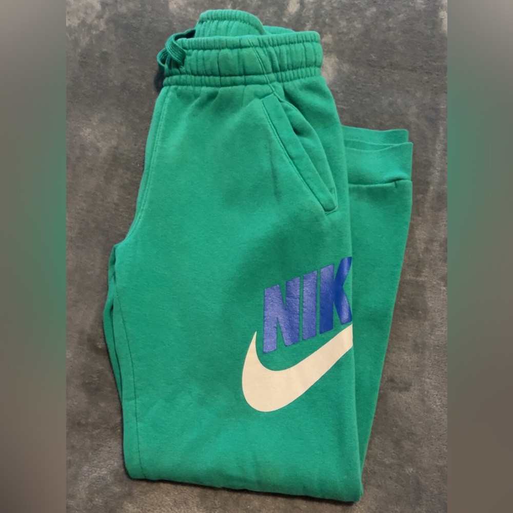Nike Kids Green Joggers with Blue Logo